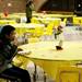 Twelve-year-old Christopher Zou eats pizza at a table in Huron High School on Friday. Daniel Brenner I AnnArbor.com